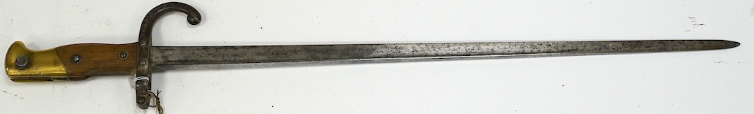 A French T-section bayonet for a Gras rifle, dated 1879. Condition - fair, pitted and worn